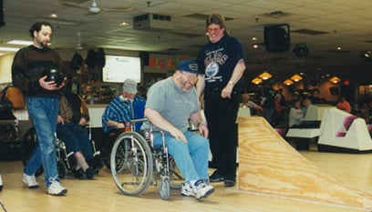 veteran in a wheelchair bowling