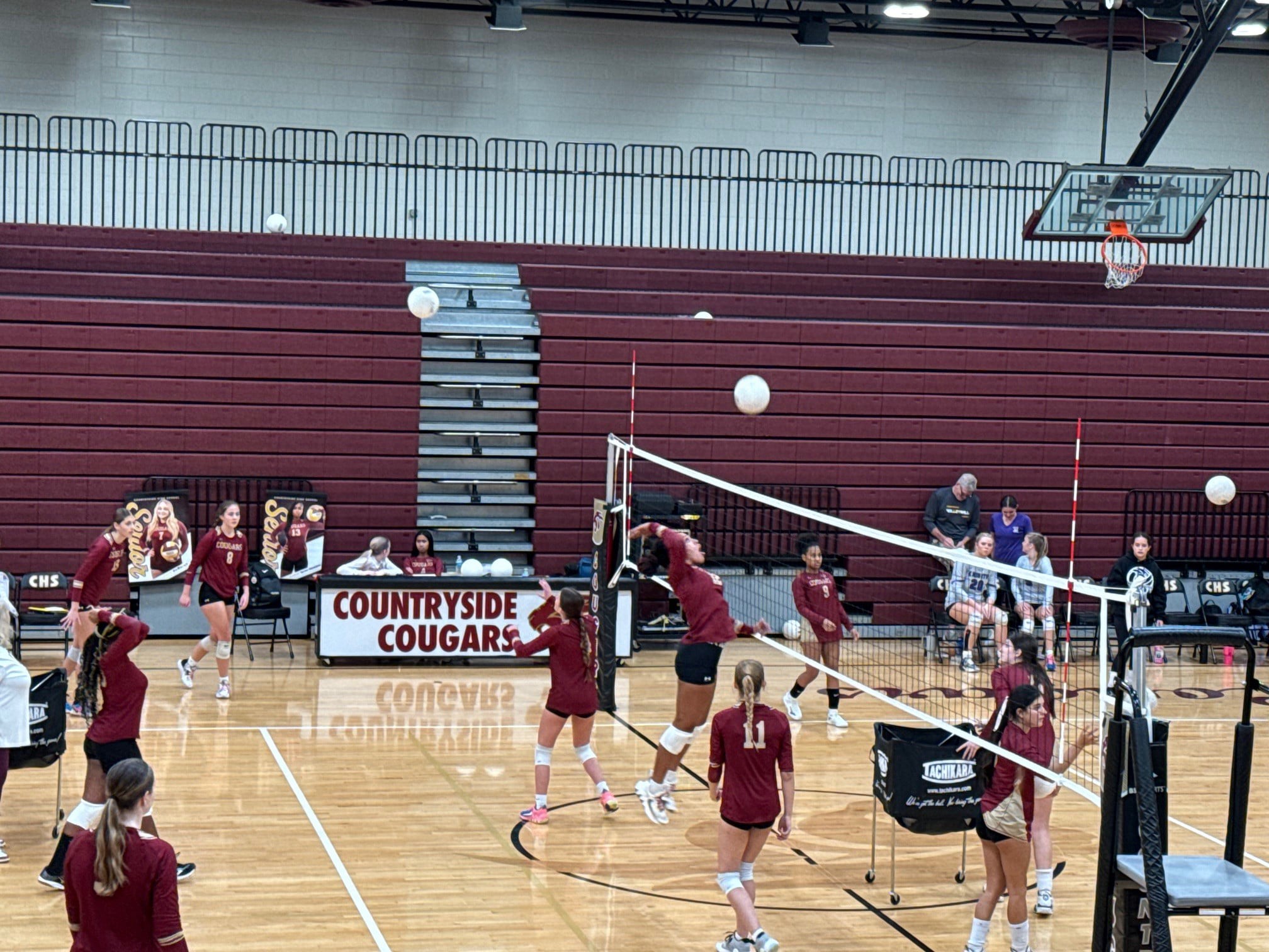 Countryside High School volleyball team playing a match