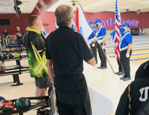 Color guard presenting on the bowling lane