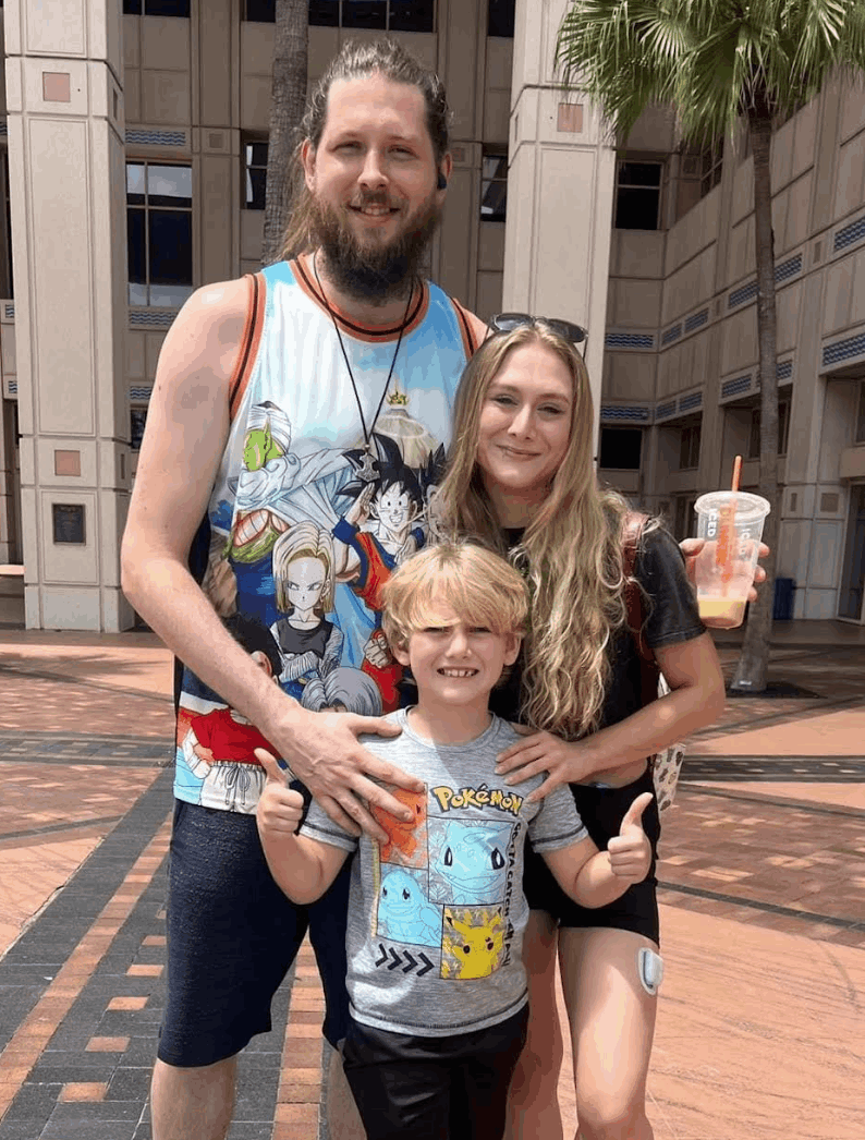 Kimberly Napier  with husband and child